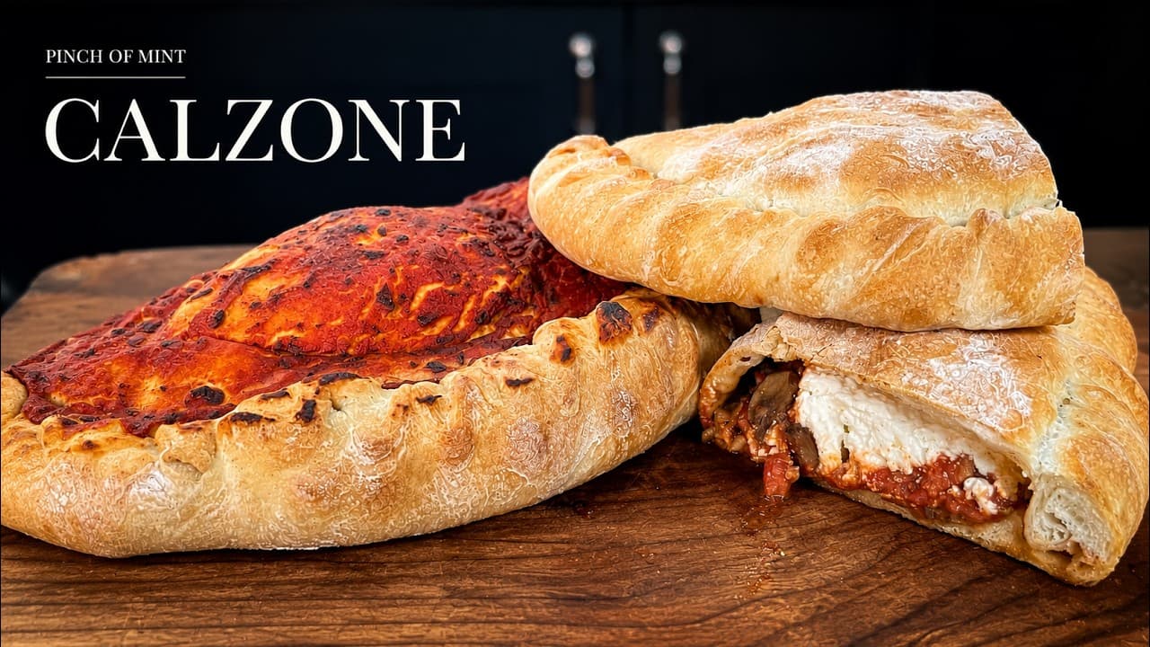 Homemade calzone, a still from its video, with the channel name and the recipe title in text across it