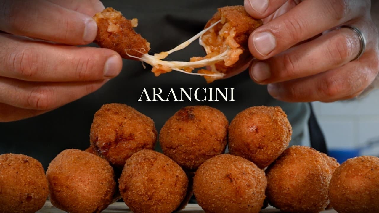 Crispy arancini from leftover risotto, a still from its video, with the channel name and the recipe title in text across it