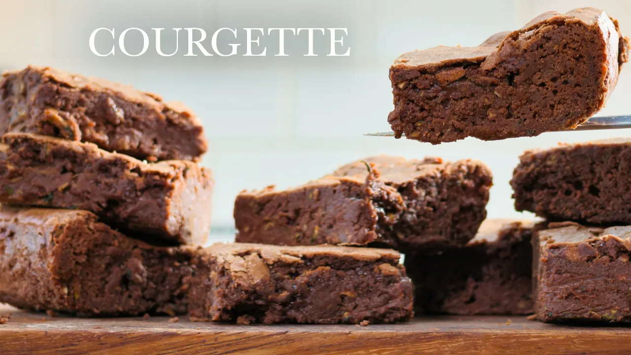 A stack of chocolate brownies with the word courgette