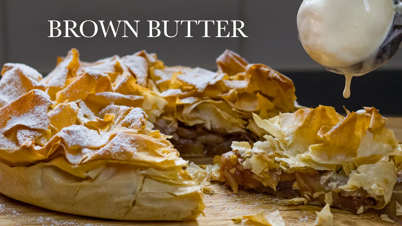 Crispy golden filo pastry apple pie with a big scoop of vanilla ice cream