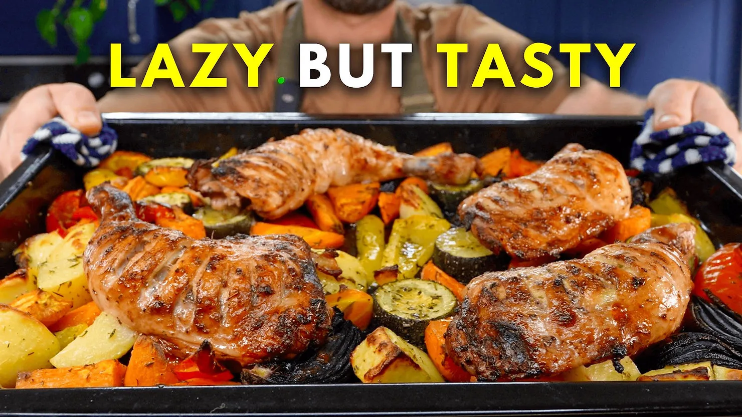 Roasted chicken legs on baked vegetables in a tray, hands holding it with oven gloves. Bold yellow text: "LAZY BUT TASTY". Vibrant colors.